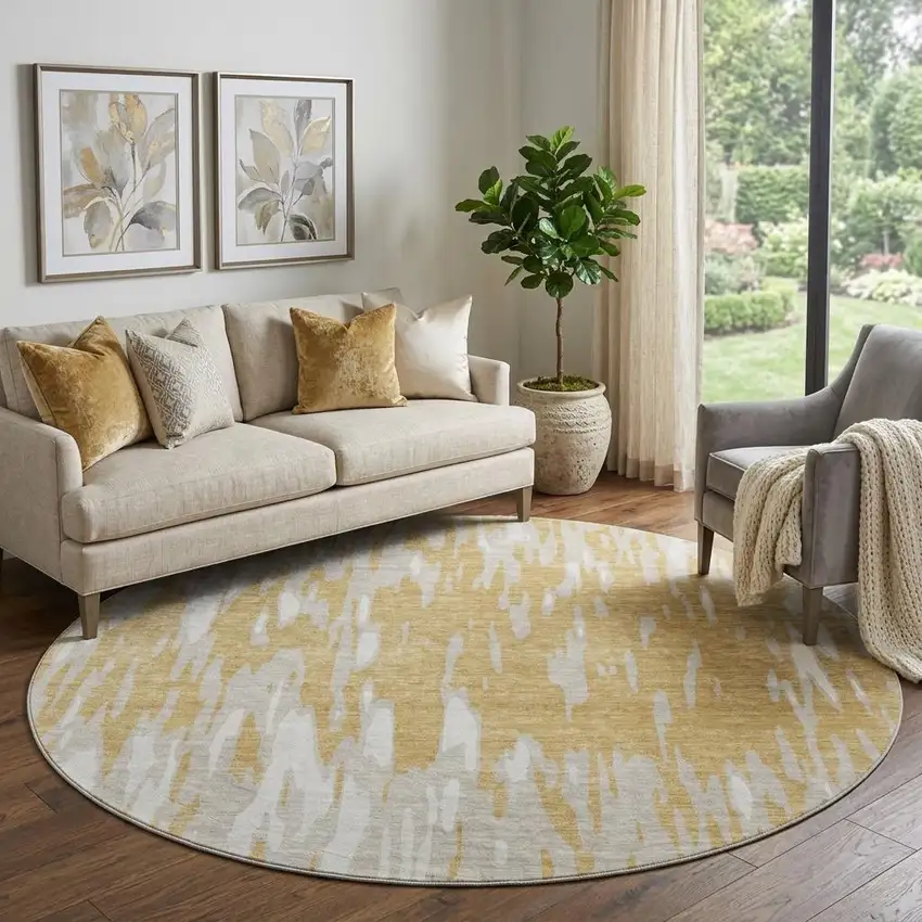8' Gold And Ivory Abstract Washable Round Rug With UV Protection Photo 1