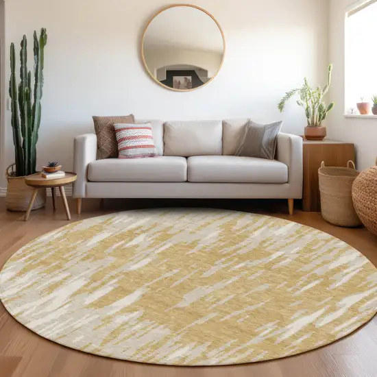 8' Gold And Ivory Abstract Washable Round Rug With UV Protection Photo 4