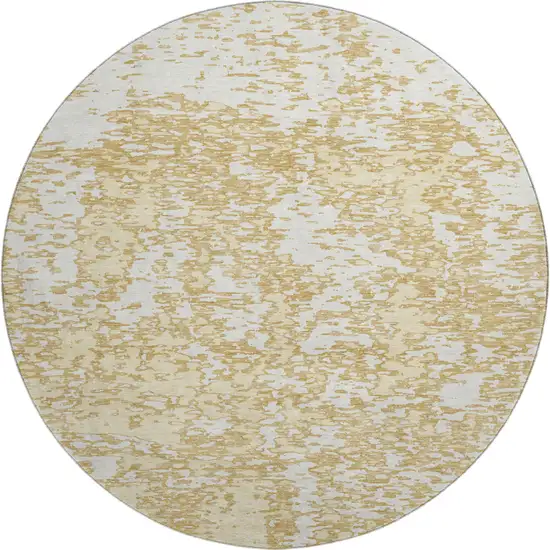 8' Gold And Ivory Abstract Washable Round Rug With UV Protection Photo 1