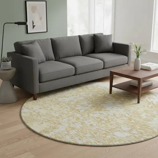 8' Gold And Ivory Abstract Washable Round Rug With UV Protection Photo 2