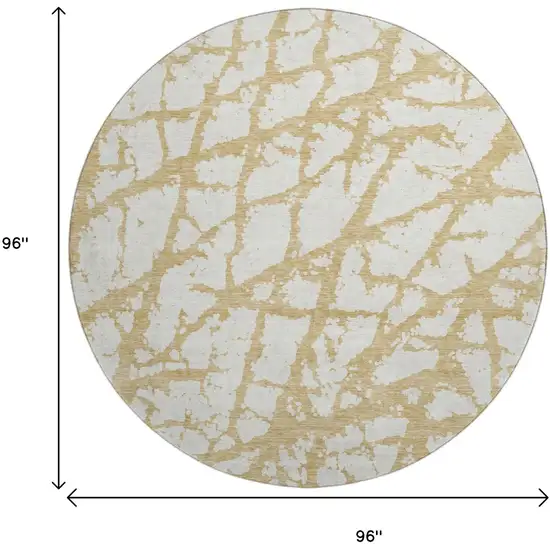 8' Gold And Ivory Abstract Washable Round Rug With UV Protection Photo 9