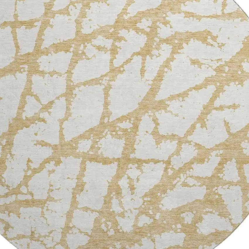 8' Gold And Ivory Abstract Washable Round Rug With UV Protection Photo 2