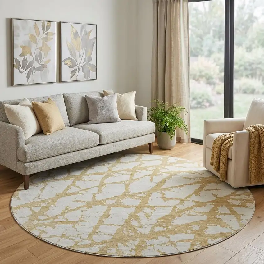 8' Gold And Ivory Abstract Washable Round Rug With UV Protection Photo 1