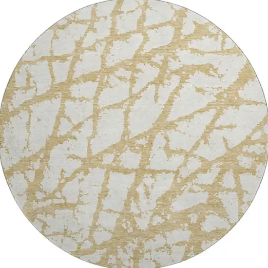 8' Gold And Ivory Abstract Washable Round Rug With UV Protection Photo 3