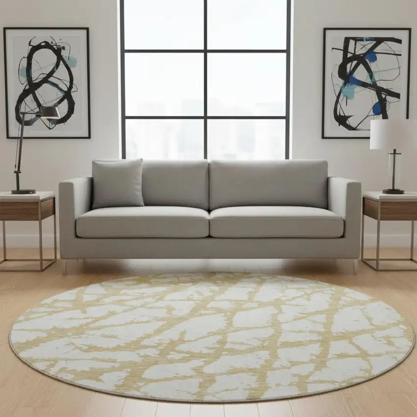 8' Gold And Ivory Abstract Washable Round Rug With UV Protection Photo 2