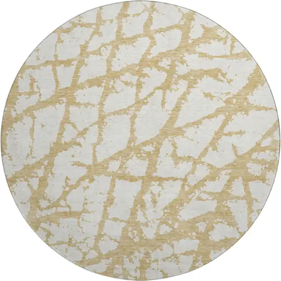 8' Gold And Ivory Abstract Washable Round Rug With UV Protection Photo 1