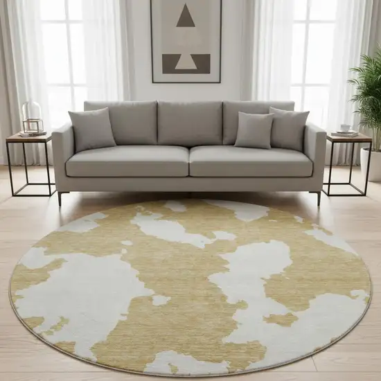 8' Gold And Ivory Abstract Washable Round Rug With UV Protection Photo 2