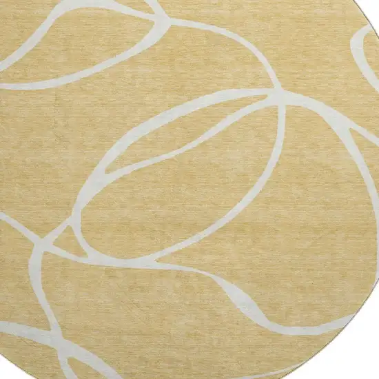 8' Gold And Ivory Abstract Washable Round Rug With UV Protection Photo 2