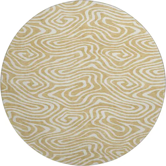 8' Gold And Ivory Abstract Washable Round Rug With UV Protection Photo 1