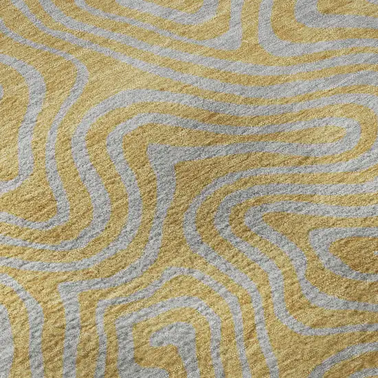 8' Gold And Ivory Abstract Washable Round Rug With UV Protection Photo 8