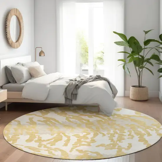 8' Gold And Ivory Animal Print Washable Round Rug With UV Protection Photo 5