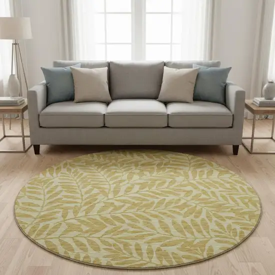 8' Gold And Ivory Botanical Leaves Washable Round Rug With UV Protection Photo 1