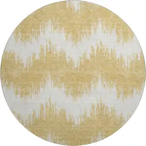 Photo of 8' Gold And Ivory Chevron Washable Round Rug With UV Protection