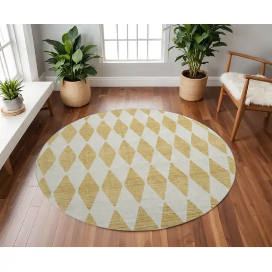 8' Gold And Ivory Diamond Washable Round Rug With UV Protection Photo 2