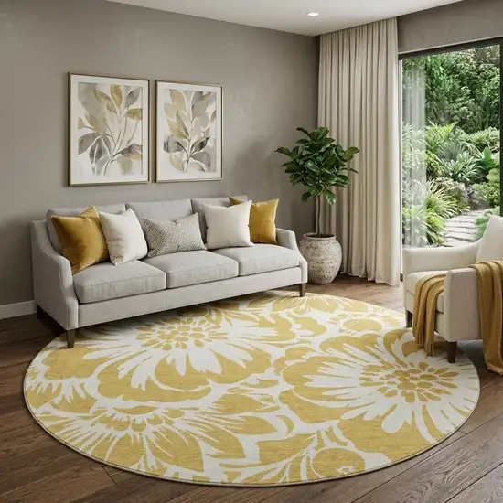 8' Gold And Ivory Floral Washable Round Rug With UV Protection Photo 1