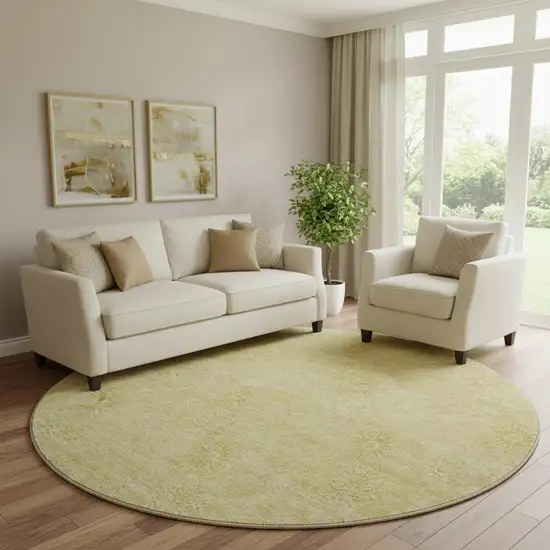 8' Gold And Ivory Floral Washable Round Rug With UV Protection Photo 1