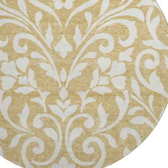 8' Gold And Ivory Floral Washable Round Rug With UV Protection Photo 3