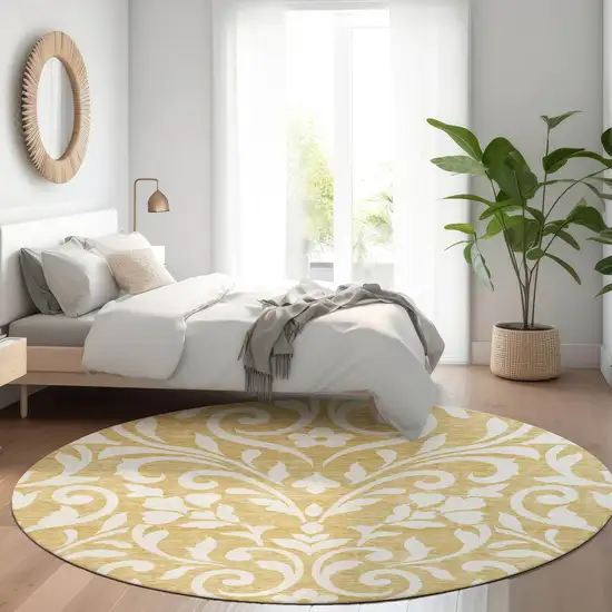 8' Gold And Ivory Floral Washable Round Rug With UV Protection Photo 5