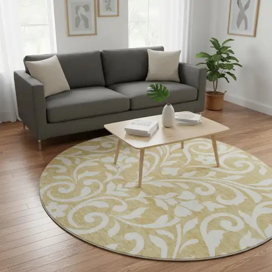8' Gold And Ivory Floral Washable Round Rug With UV Protection Photo 2