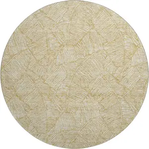 Photo of 8' Gold And Ivory Floral Washable Round Rug With UV Protection
