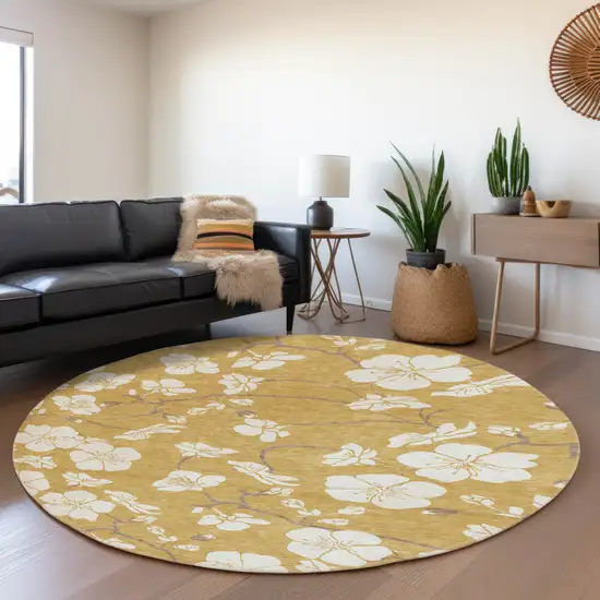 8' Gold And Ivory Floral Washable Round Rug With UV Protection Photo 4