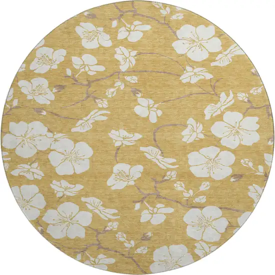 8' Gold And Ivory Floral Washable Round Rug With UV Protection Photo 1