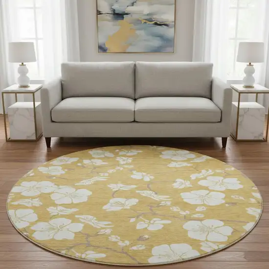 8' Gold And Ivory Floral Washable Round Rug With UV Protection Photo 2