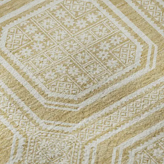 8' Gold And Ivory Geometric Washable Area Rug With UV Protection Photo 9