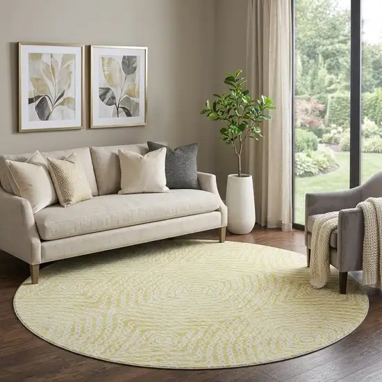 8' Gold And Ivory Geometric Washable Round Rug With UV Protection Photo 1
