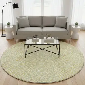 Photo of 8' Gold And Ivory Geometric Washable Round Rug With UV Protection
