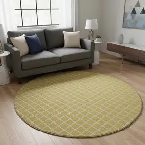 Photo of 8' Gold And Ivory Geometric Washable Round Rug With UV Protection