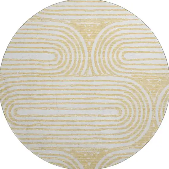 8' Gold And Ivory Geometric Distressed Washable Round Rug With UV Protection Photo 3