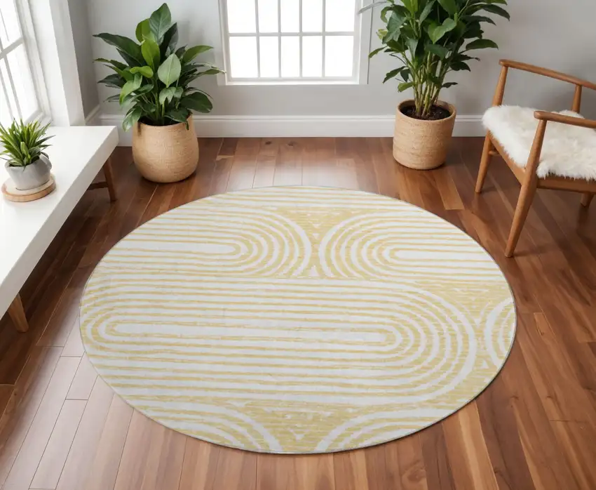 8' Gold And Ivory Geometric Washable Round Rug With UV Protection Photo 2