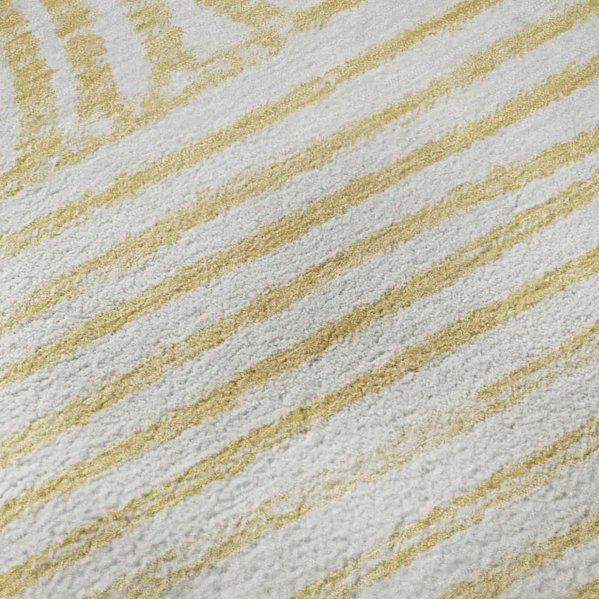 8' Gold And Ivory Geometric Distressed Washable Round Rug With UV Protection Photo 9