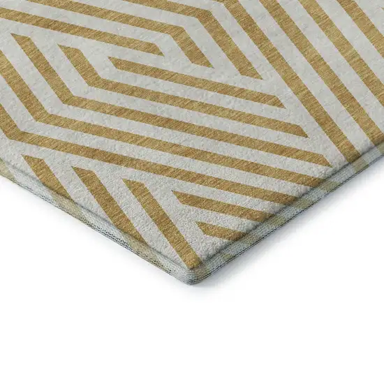 8' Gold And Ivory Geometric Washable Round Rug With UV Protection Photo 6