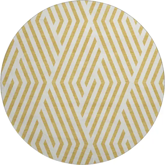 8' Gold And Ivory Geometric Washable Round Rug With UV Protection Photo 1