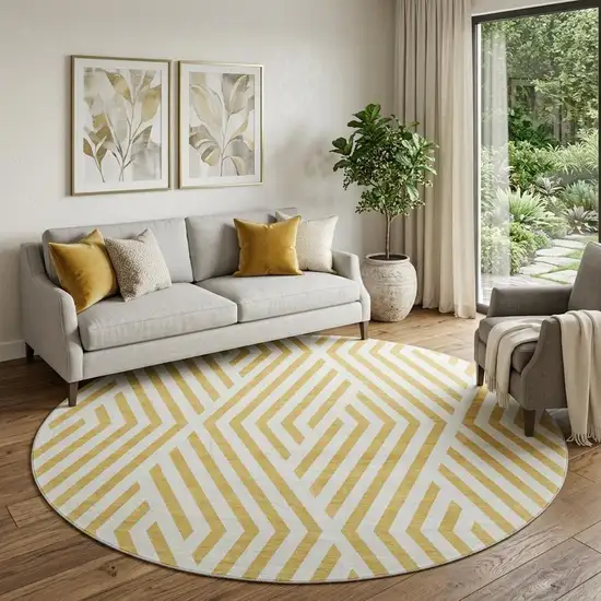 8' Gold And Ivory Geometric Washable Round Rug With UV Protection Photo 1