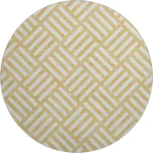 Photo of 8' Gold And Ivory Geometric Washable Round Rug With UV Protection