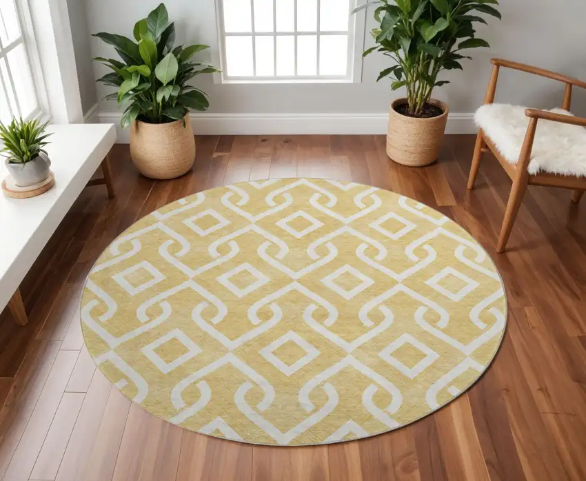 8' Gold And Ivory Geometric Washable Round Rug With UV Protection Photo 3