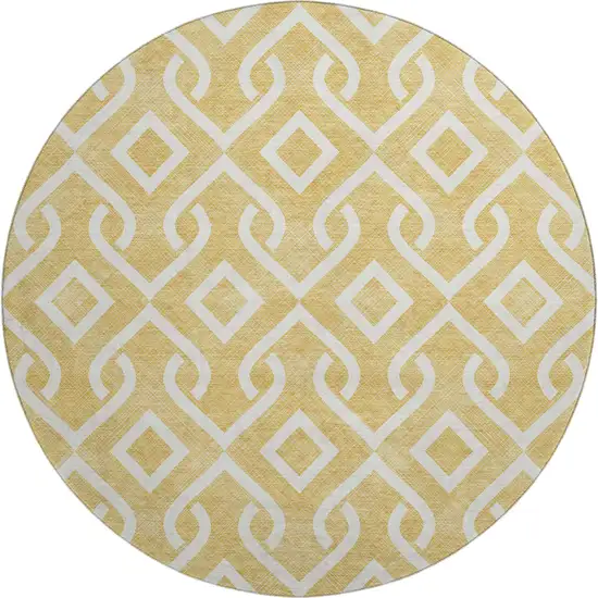 8' Gold And Ivory Geometric Washable Round Rug With UV Protection Photo 1