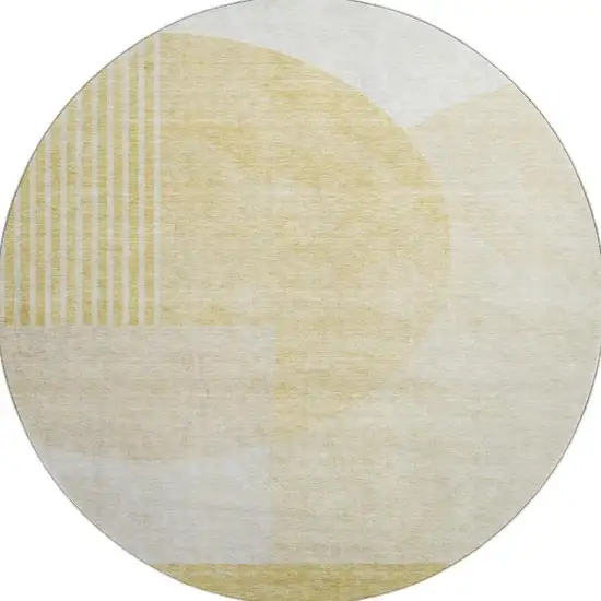 8' Gold And Ivory Geometric Washable Round Rug With UV Protection Photo 1