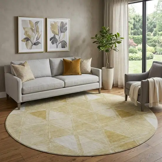 8' Gold And Ivory Geometric Washable Round Rug With UV Protection Photo 1