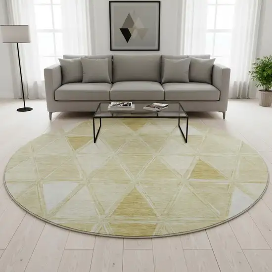 8' Gold And Ivory Geometric Washable Round Rug With UV Protection Photo 2