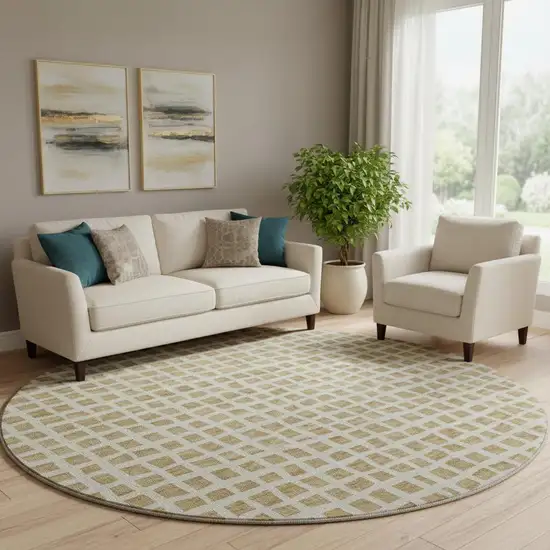 8' Gold And Ivory Geometric Washable Round Rug With UV Protection Photo 1