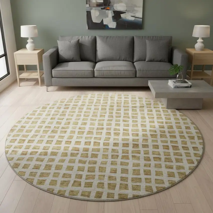 8' Gold And Ivory Geometric Washable Round Rug With UV Protection Photo 2