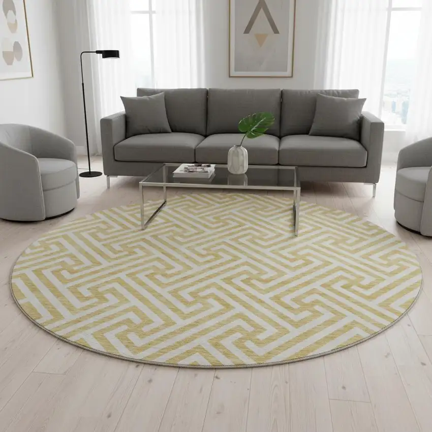 8' Gold And Ivory Geometric Washable Round Rug With UV Protection Photo 2