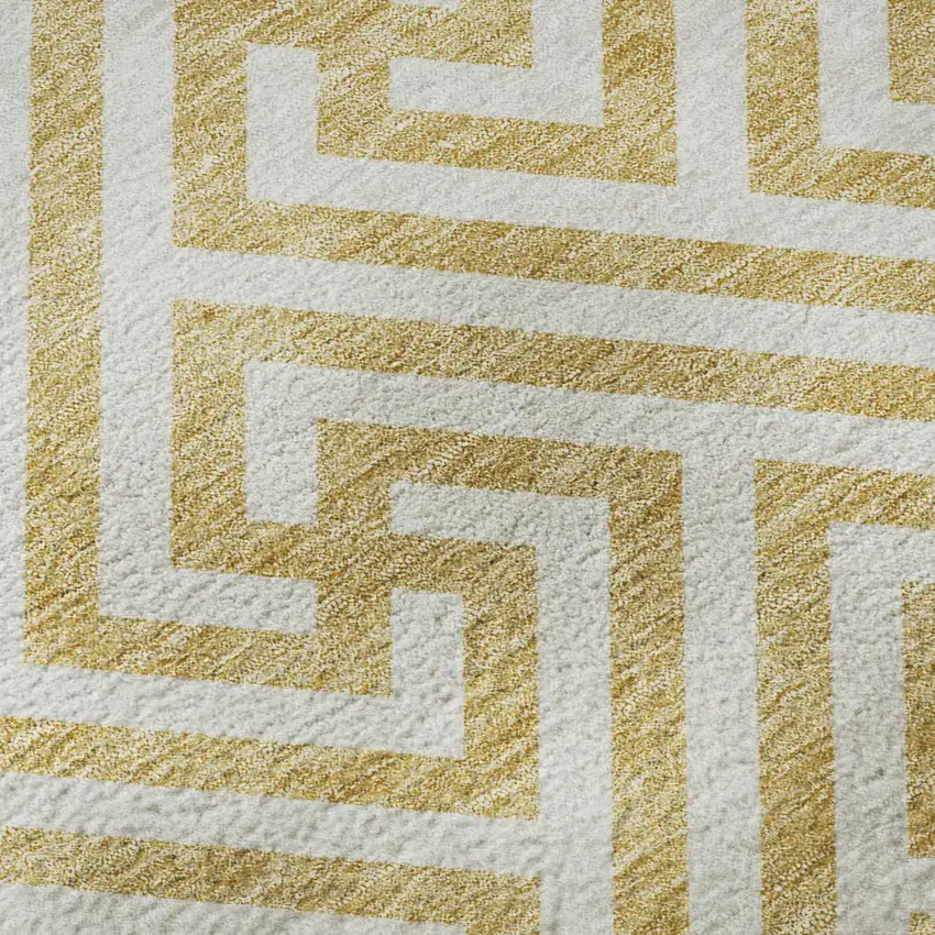 8' Gold And Ivory Geometric Washable Round Rug With UV Protection Photo 9