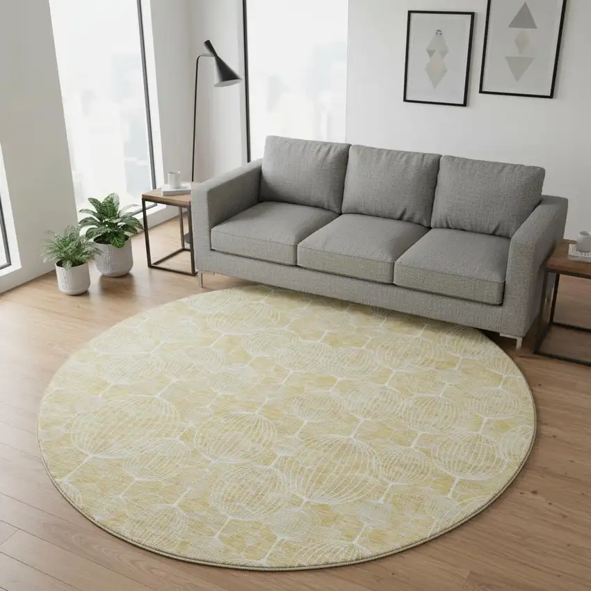 8' Gold And Ivory Geometric Washable Round Rug With UV Protection Photo 2