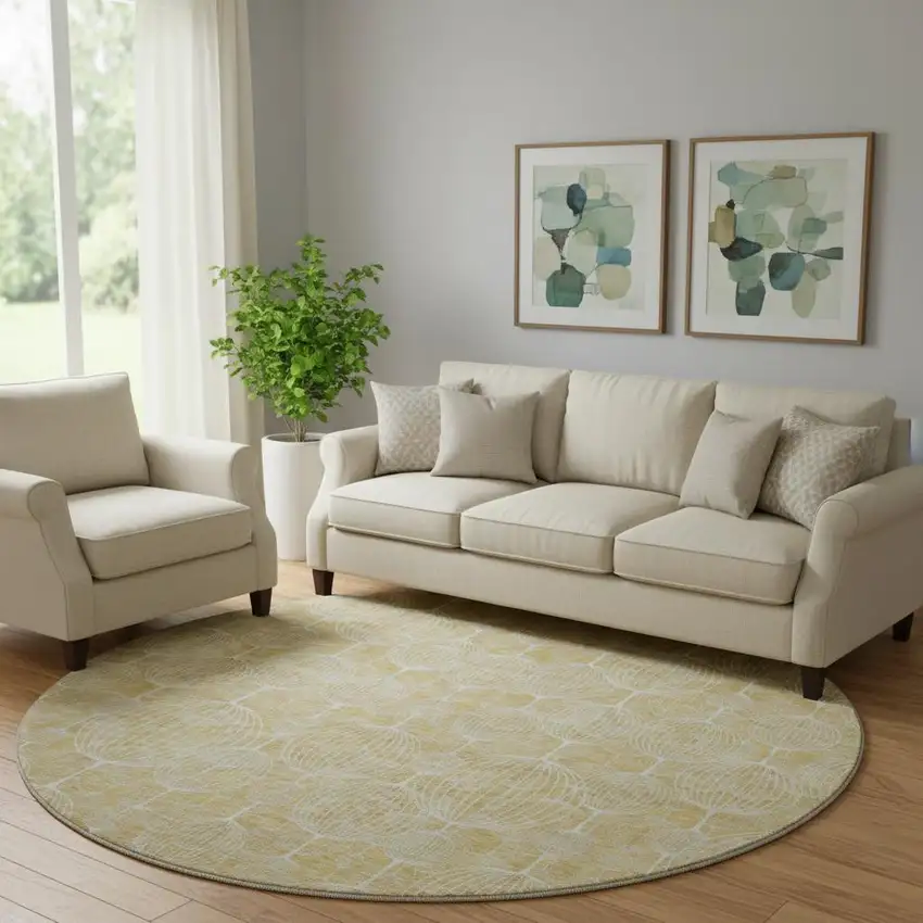 8' Gold And Ivory Geometric Washable Round Rug With UV Protection Photo 1