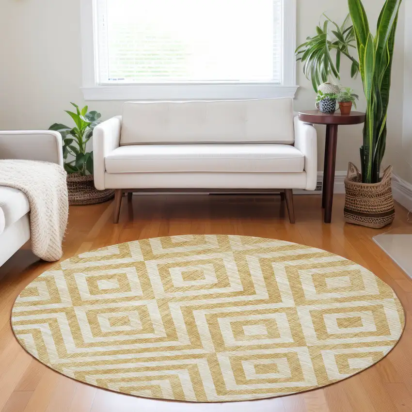 8' Gold And Ivory Geometric Washable Round Rug With UV Protection Photo 5